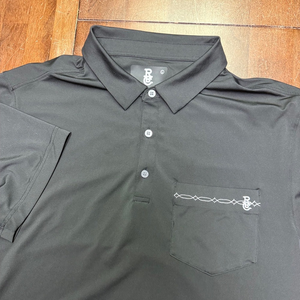 Raised By Coyotes Polo Shirt Mens Large Black Barbed Wire Pocket Performance